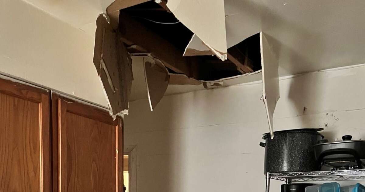 Officials were looking for a murder suspect in Tennessee. Then he came crashing through the ceiling