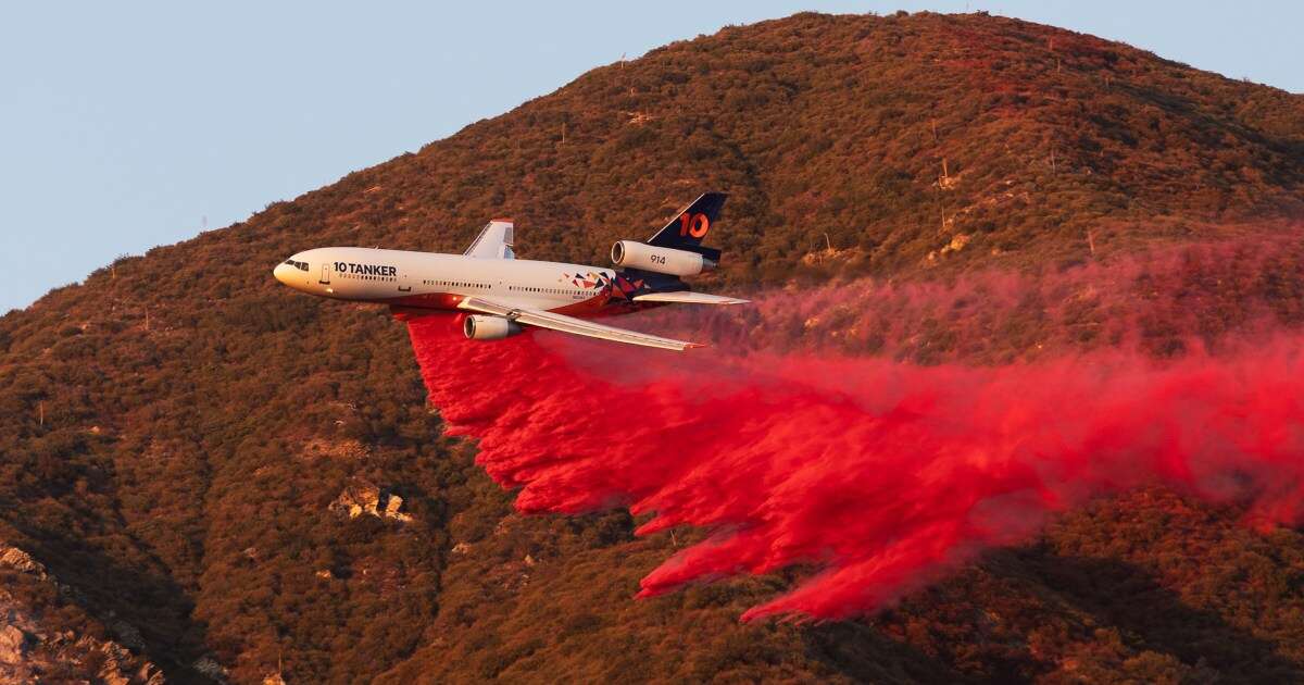 What is the pink powder sprayed over the California wildfires?