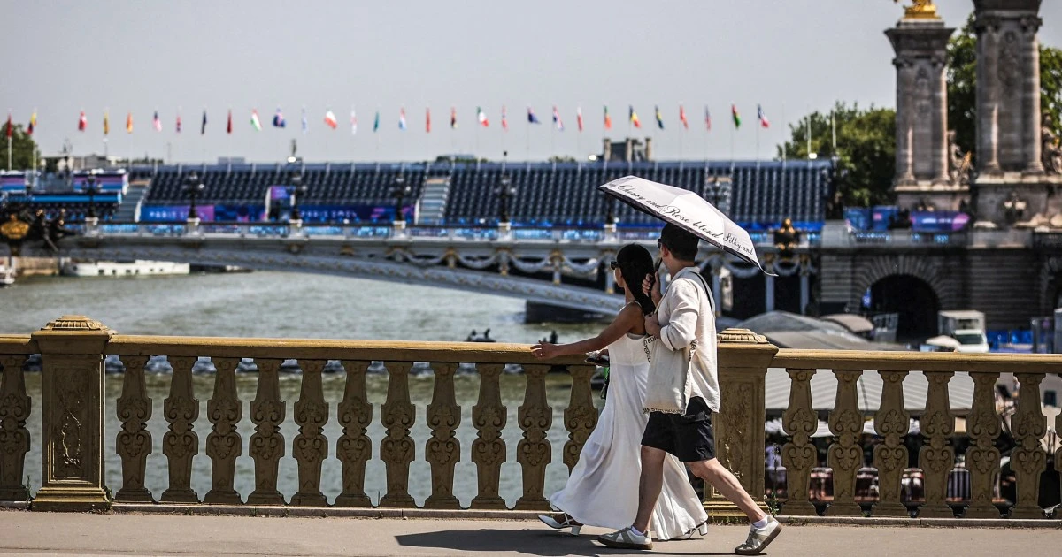 Triathletes will swim in Seine as last-minute testing shows the river is safe