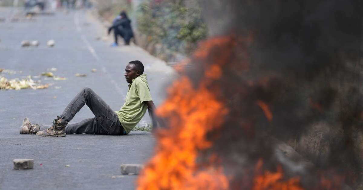 Tear gas, stones and flames as violence erupts in Kenya and protesters call for president's ouster