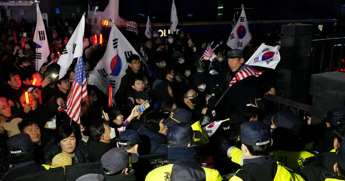 South Korea’s impeached president arrested over martial law declaration as his supporters riot