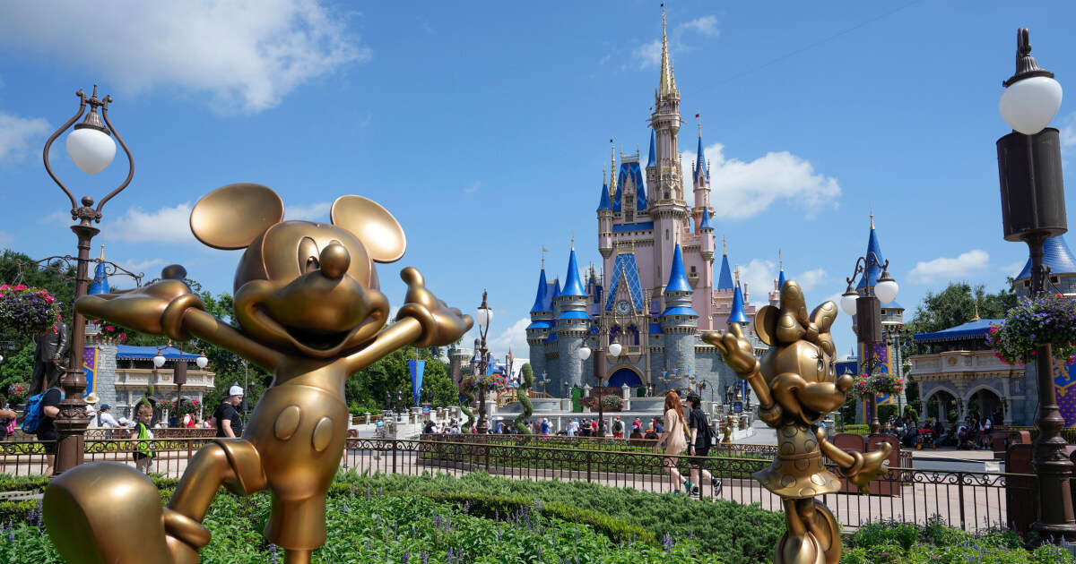 At Disney World, adult visitors increasingly mix remote work and play