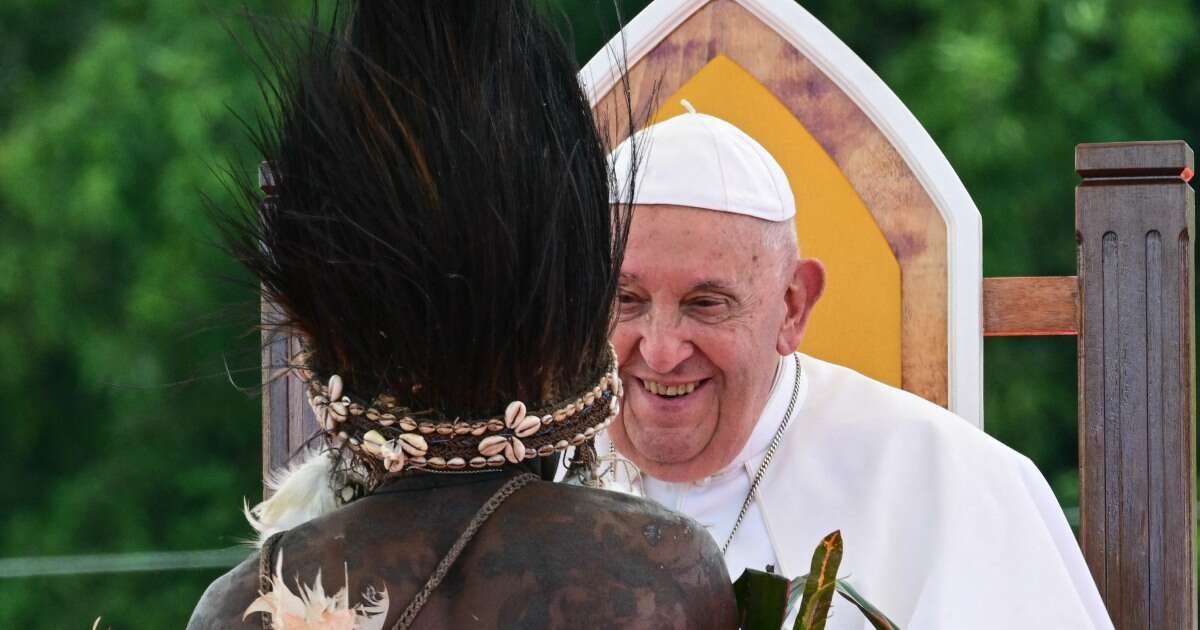 Pope arrives in the remote jungles of Papua New Guinea with humanitarian aid and toys 