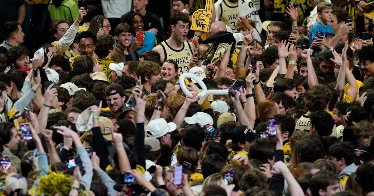 Storm brewing in college basketball: Should fans be banned from rushing floor? 