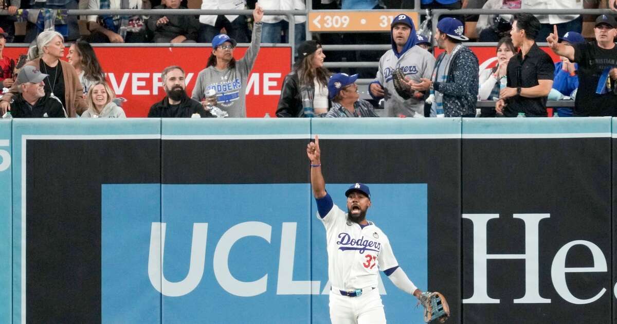 Gleyber Torres' hit called a double after fan interfered and reached over stands to make the catch