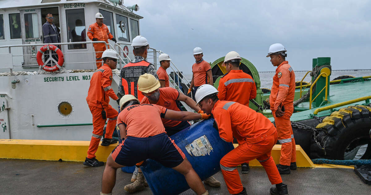 Race against time to clear oil spill in Philippines as Typhoon Gaemi wreaks havoc in Asia