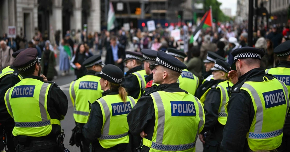 London police out in force to deal with rival rallies and a soccer final