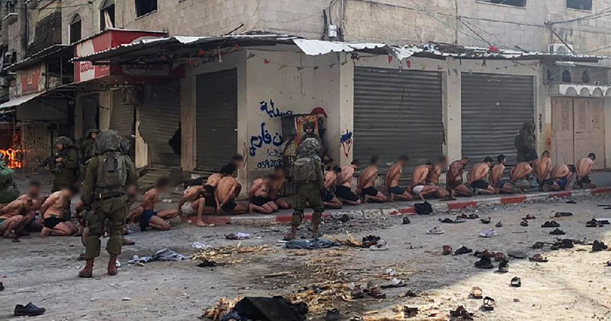 Stripped, blindfolded and ‘humiliated’: Images show dozens of men detained by Israeli forces in Gaza