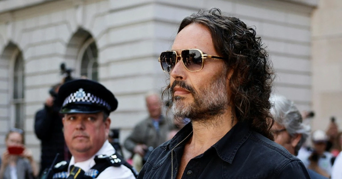 Russell Brand arrives at court to face rape and sexual assault charges