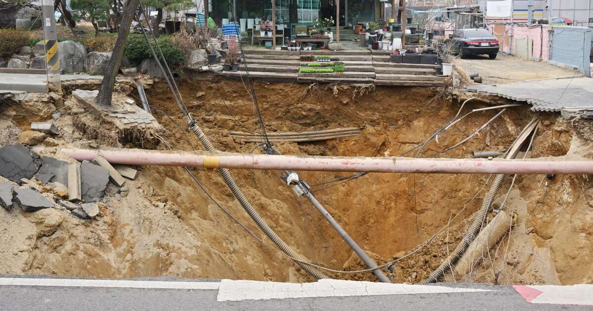 Motorcyclist dies after being swallowed by sinkhole in South Korea