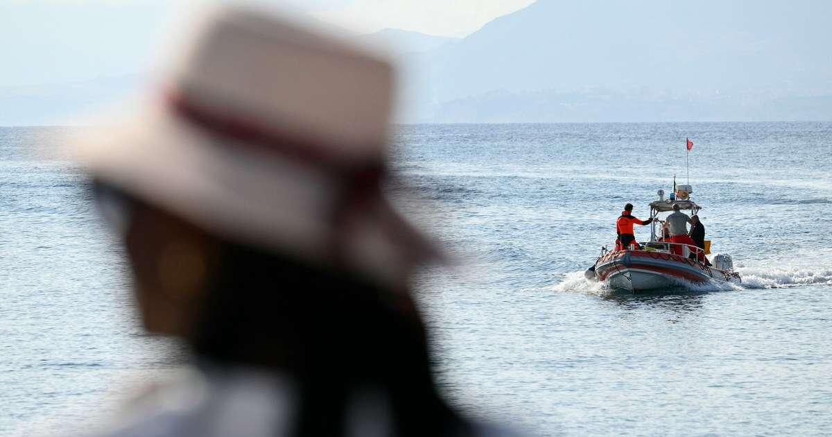 Divers say despite breakthroughs, debris is hampering search for 6 missing on sunken superyacht