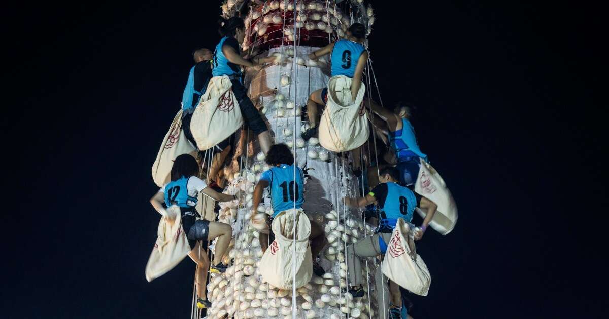 In Hong Kong, a midnight race up a bamboo tower of buns