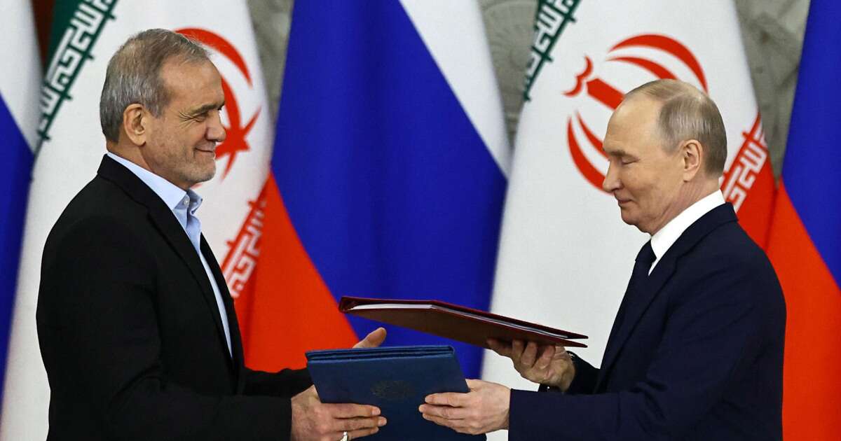 Russia and Iran sign a partnership treaty to deepen their ties in the face of Western sanctions