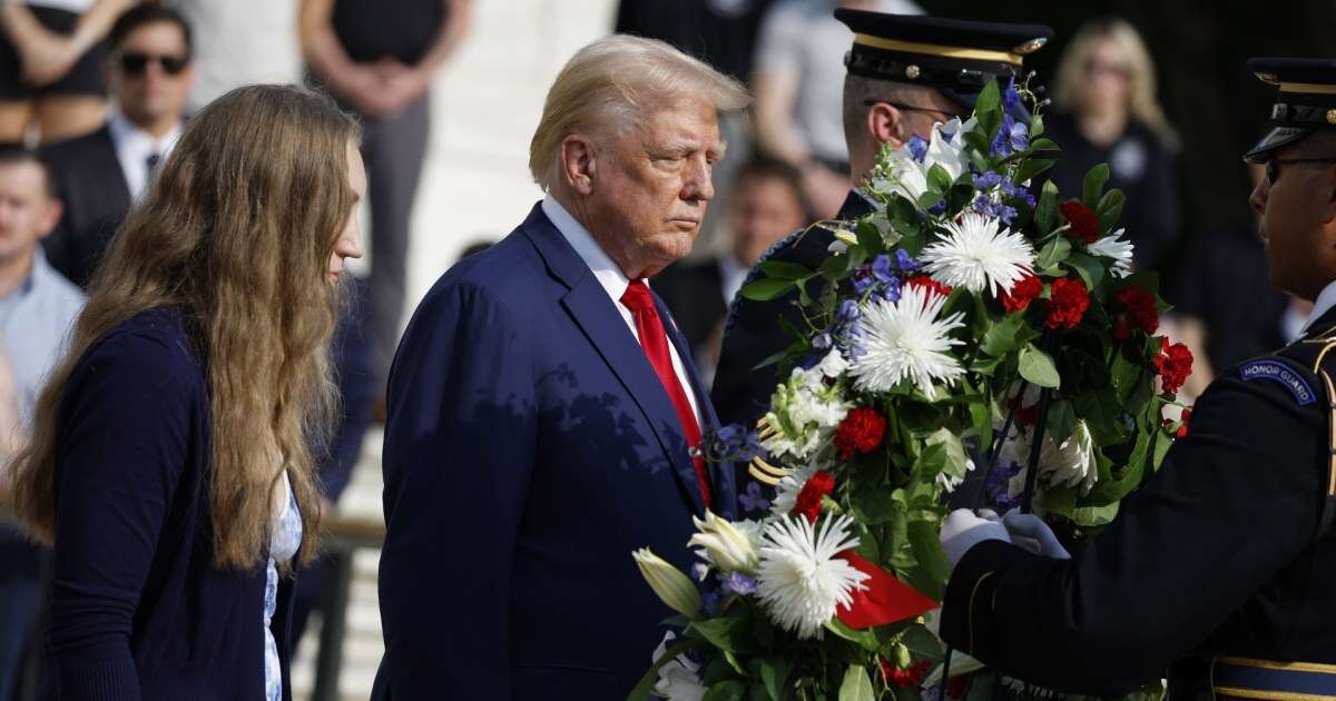 Official says Trump aide 'pushed aside' Arlington National Cemetery employee