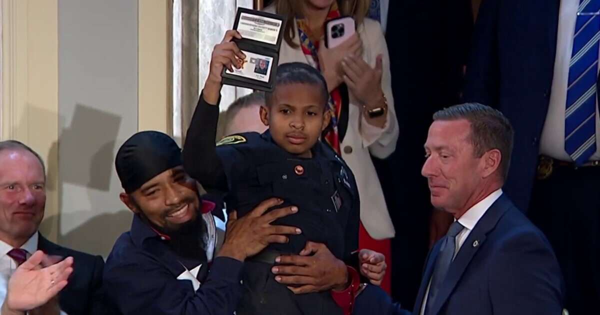 Trump awards teen who beat cancer with honorary Secret Service title