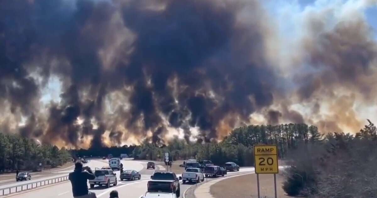 Firefighters rush to contain massive brush fire on Long Island