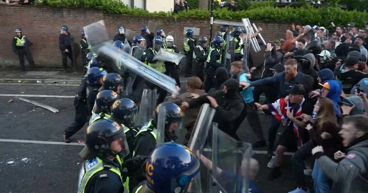 Protesters clash with U.K. police over arrest of dying teenager