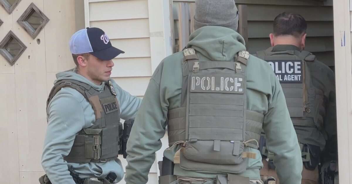 Federal agents seen taking part in a suspected ICE raid in Boston