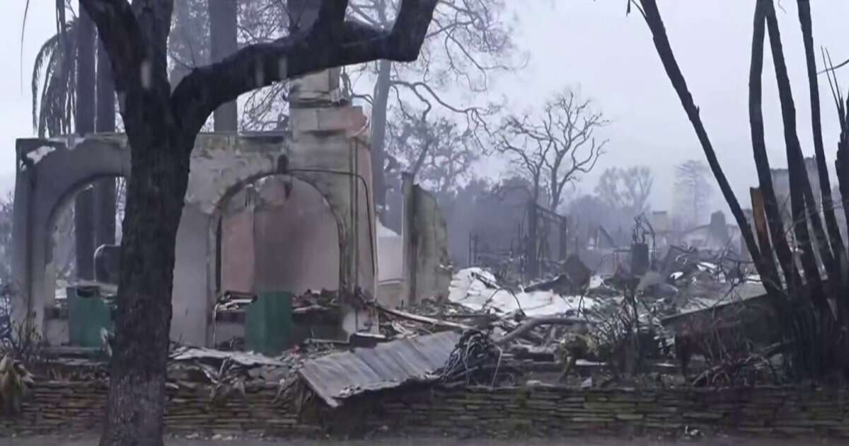 Rain storm batters L.A., threatening mudslides as residents return after wildfires