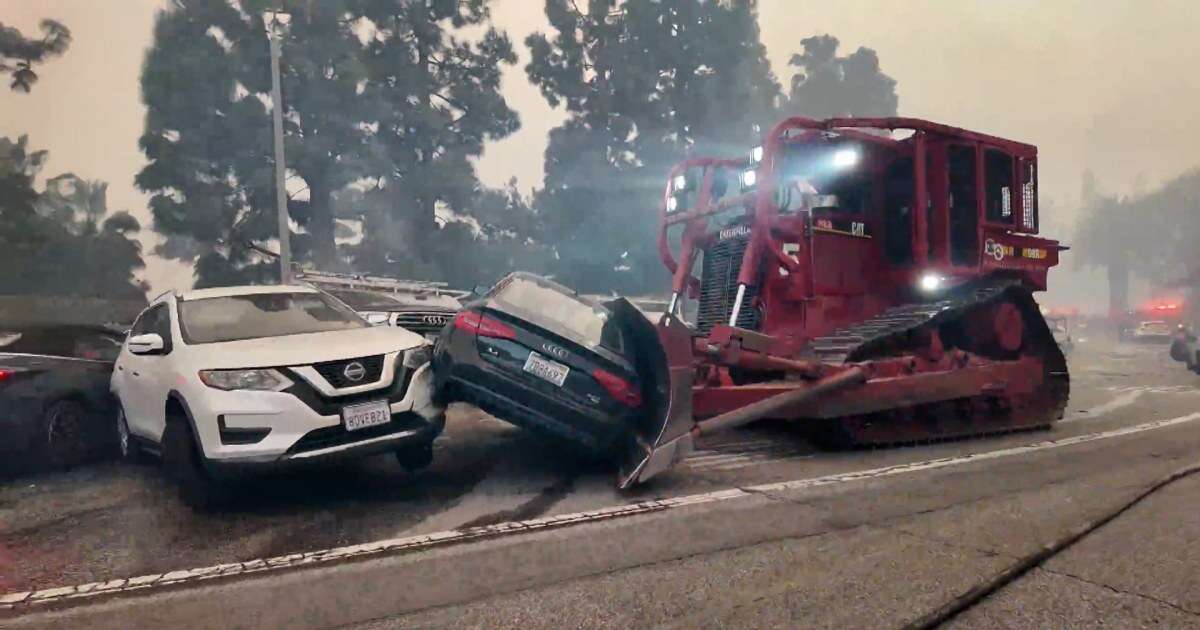 Bulldozer moves cars blocking Palisades Fire escape route