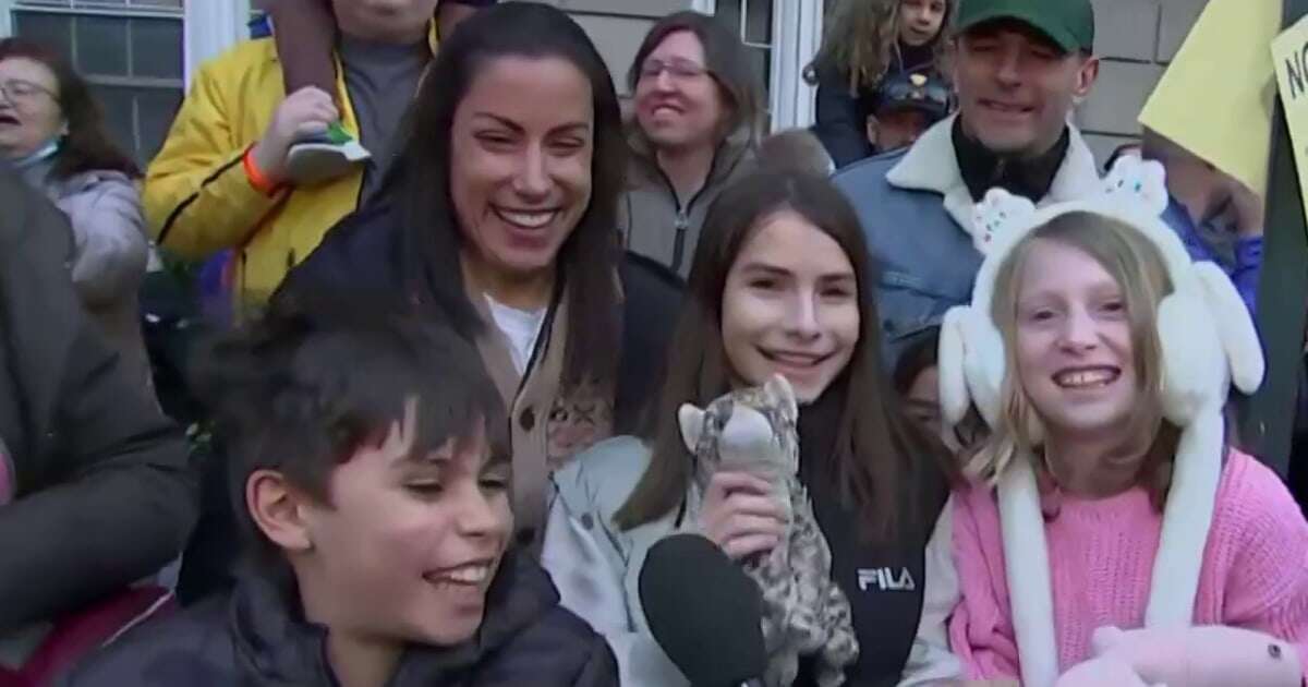 Kids share excitement as balloons are inflated for Macy's Thanksgiving Day Parade