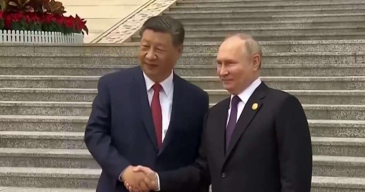 Russia's Putin greeted by Xi Jinping at the start of a two-day visit to China