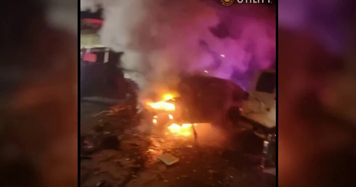 Video shows Florida officer rescue people trapped in burning car
