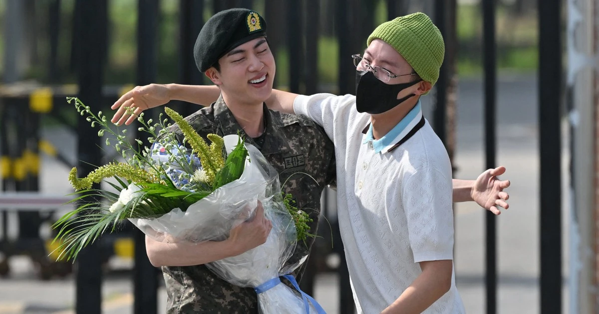 Jin greeted by BTS colleagues as he leaves South Korean army after national service