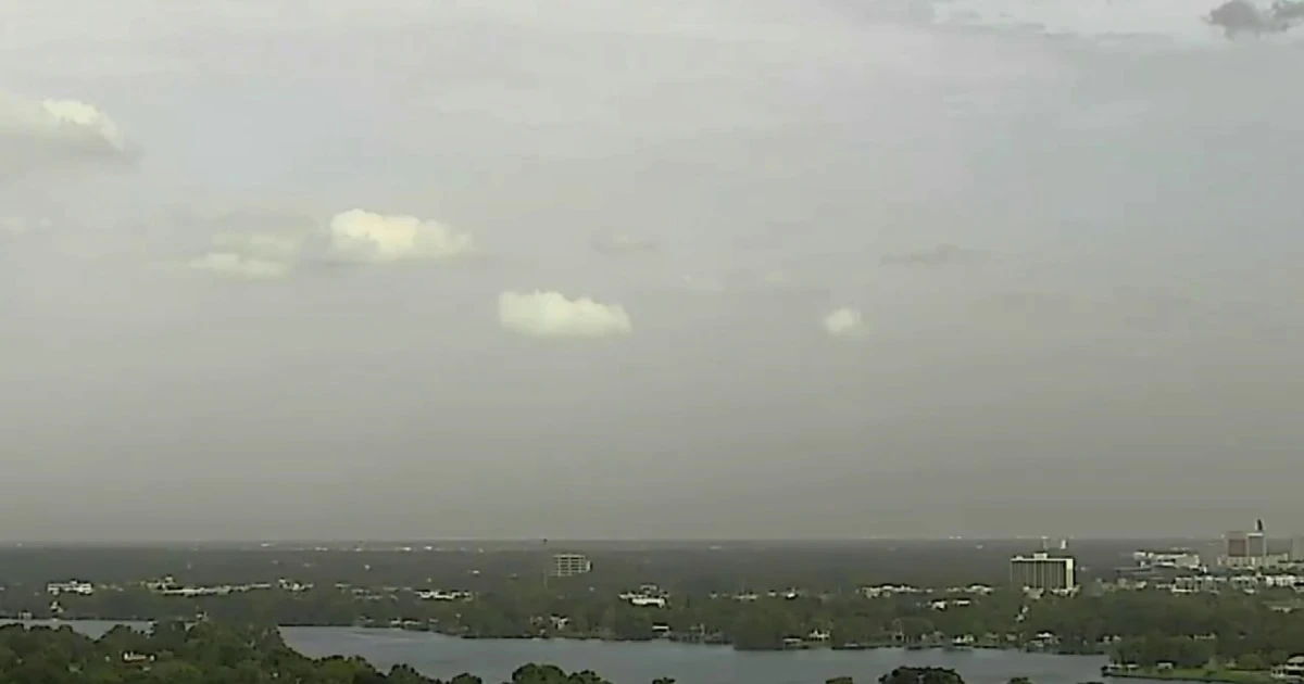 Saharan dust cloud blankets South Florida, leaving haze and dust-coated cars