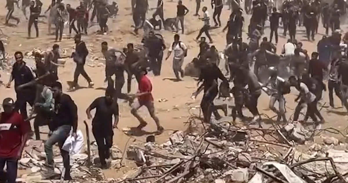 Dozens killed at Gaza aid site after shots fired into crowd