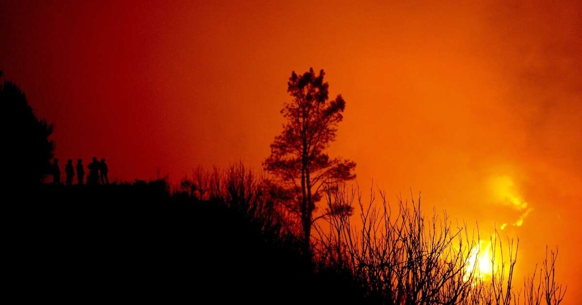 Cause of California wildfires remains unknown as winds pick up