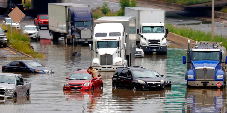 Vehicles stuck on flooded Detroit freeways after torrential downpour