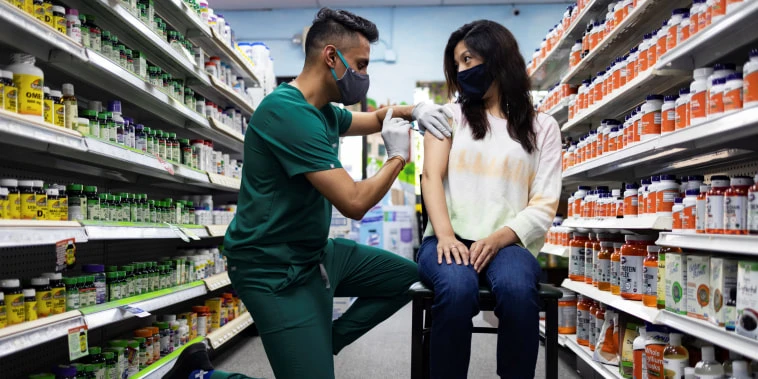 As U.S. pushes booster shots, moral predicament emerges