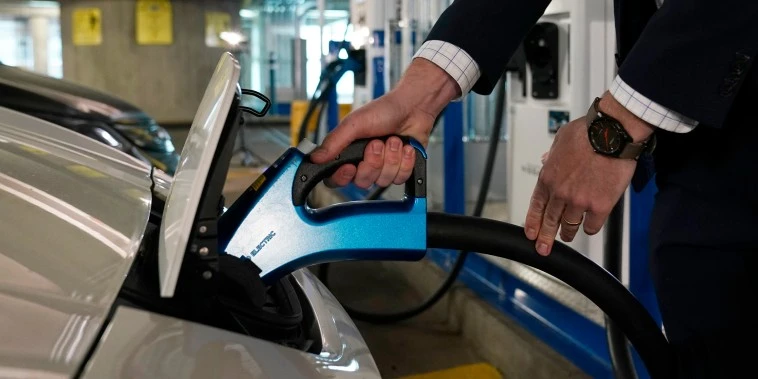Biden wants millions of electric vehicles on the roads. Can the power grid handle it?