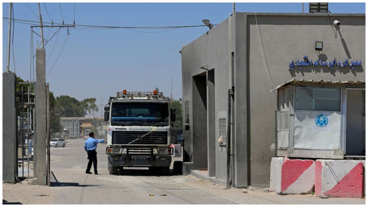 Israel agrees to reopen southern Gaza border crossing to permit more aid