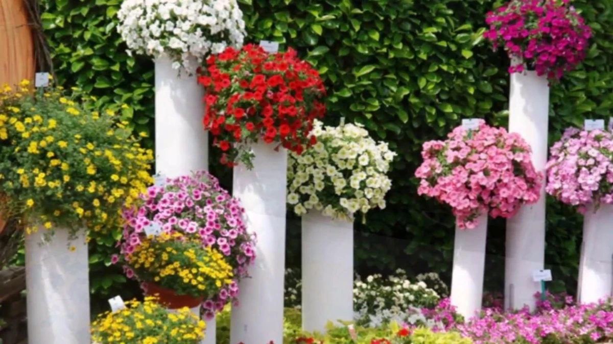 Transforme sua casa com uma torre de flores simples usando um cano velho