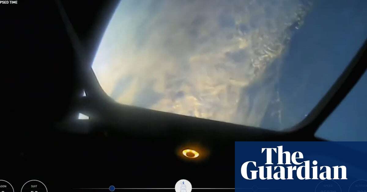 'A perfect world': billionaire's helmet cam shows moment of first ever private spacewalk – video