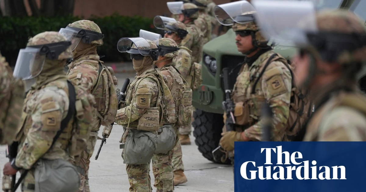 National guard deploys in downtown LA amid eerie calm after two days of unrest
