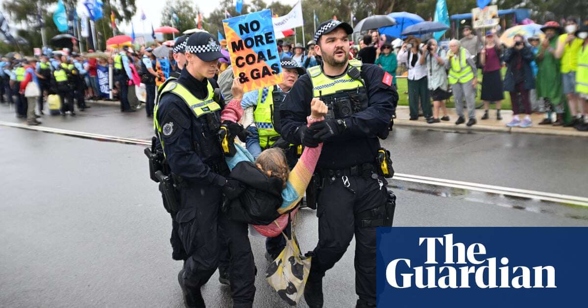 Rising Tide protesters arrested in Canberra for blocking road to Parliament House