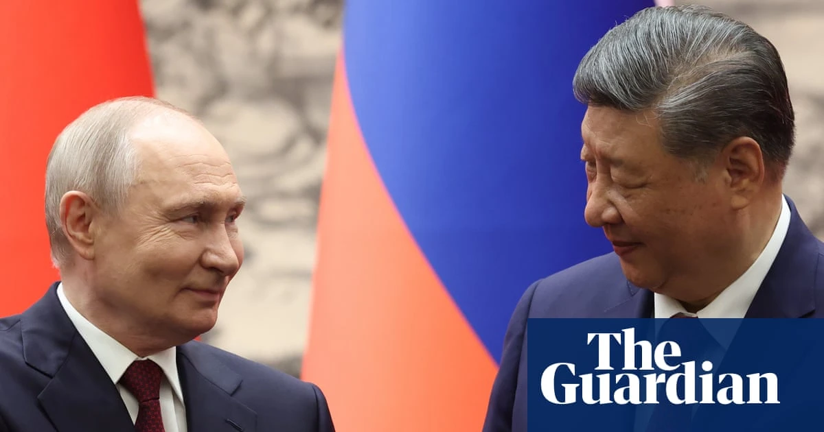 Xi and Putin highlight close China-Russia ties during Beijing visit – video