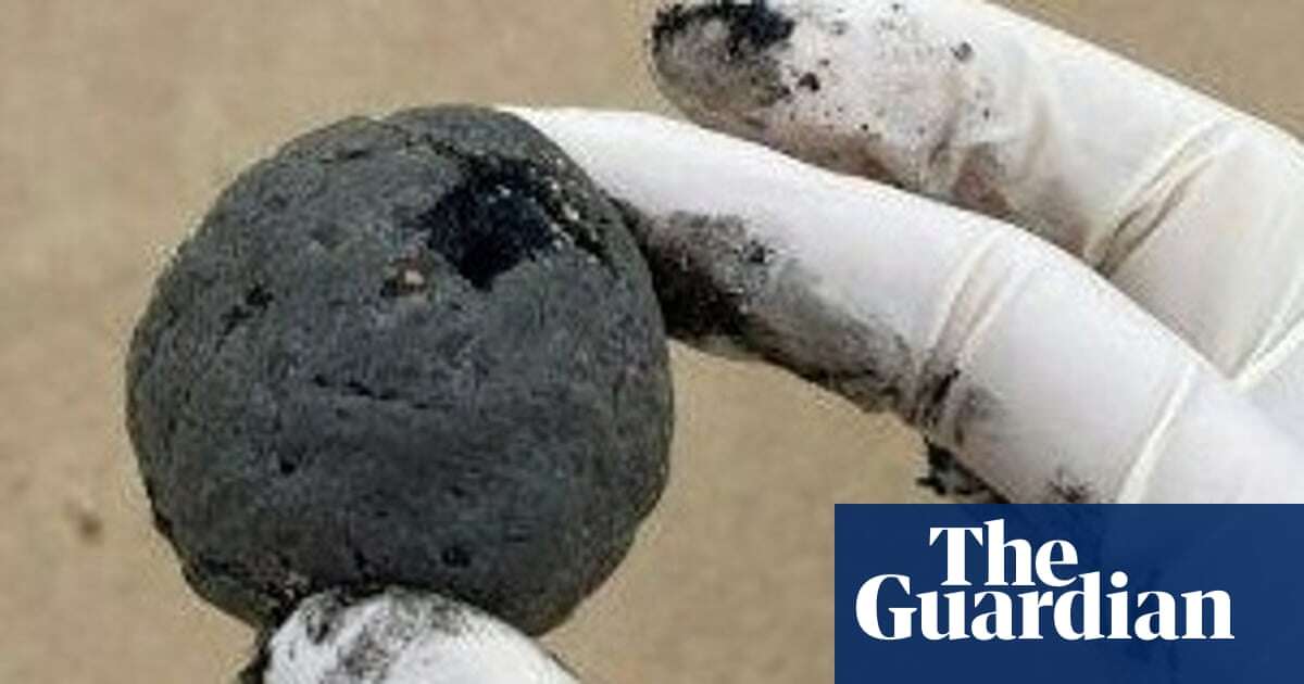 Sydney’s Coogee beach closed after mysterious black balls wash ashore