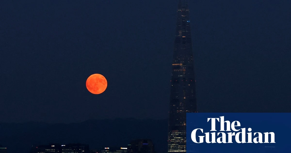 Rare blue supermoon lights up night skies globally – video