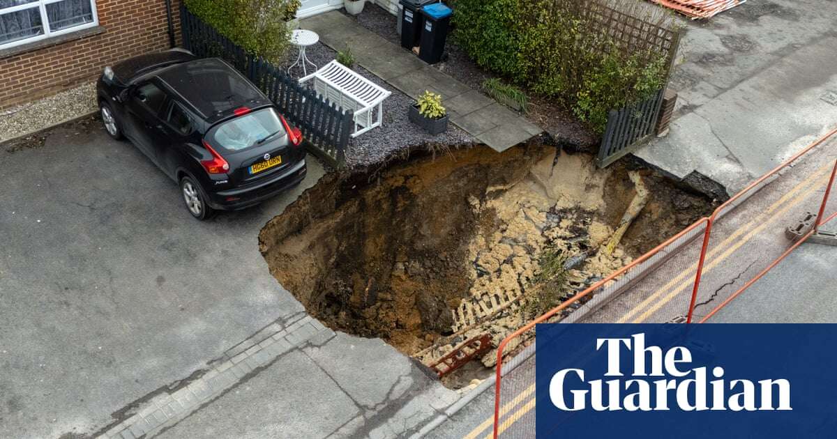 What are sinkholes, how are they formed and why did one appear in a Surrey street?