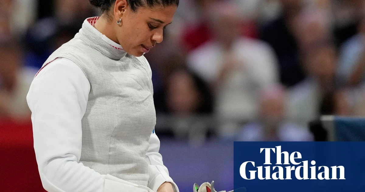 French fencer cleared of doping charge on account of kissing her American partner