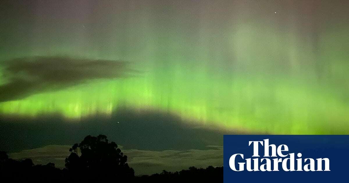 Aurora australis: southern lights ignite the sky across Australia after solar storm – video