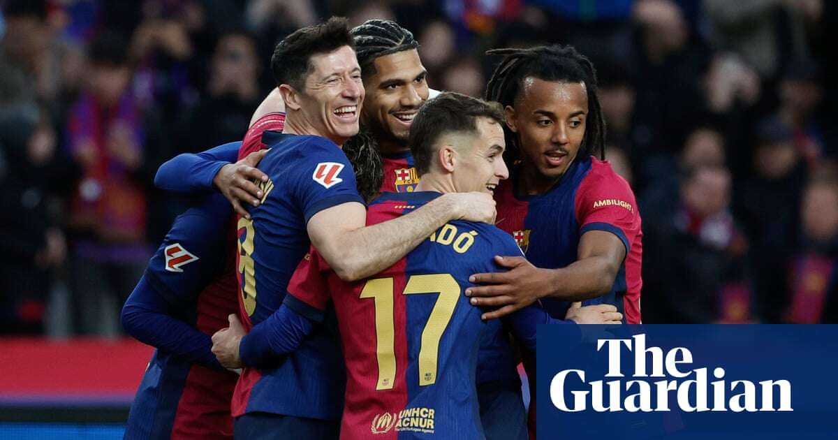 European football: Lewandowski caps win over 10-man Sociedad as Barça go top