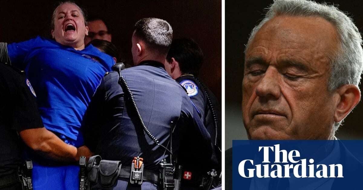 'You are!': protesters disrupt RFK confirmation hearing as he claims he's not anti-vaccine – video