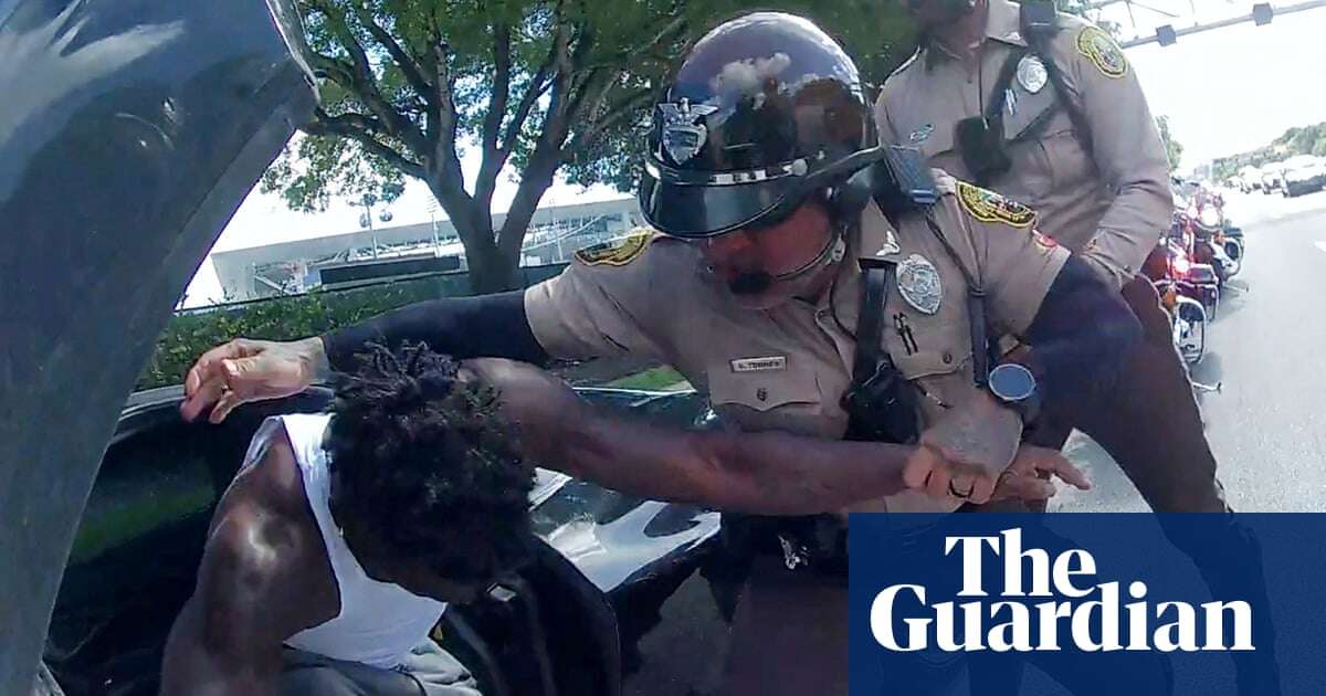 Tyreek Hill: footage shows police dragging NFL star from car – video