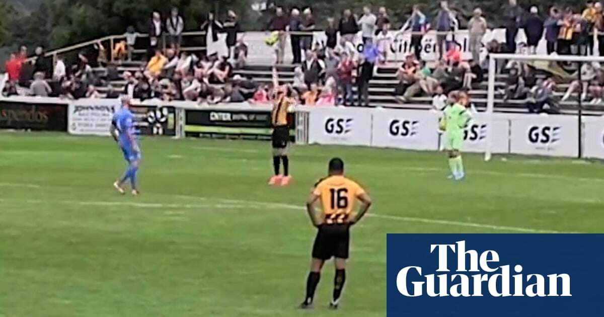 Frustrated footballer sent off after 'piggy in the middle' altercation – video