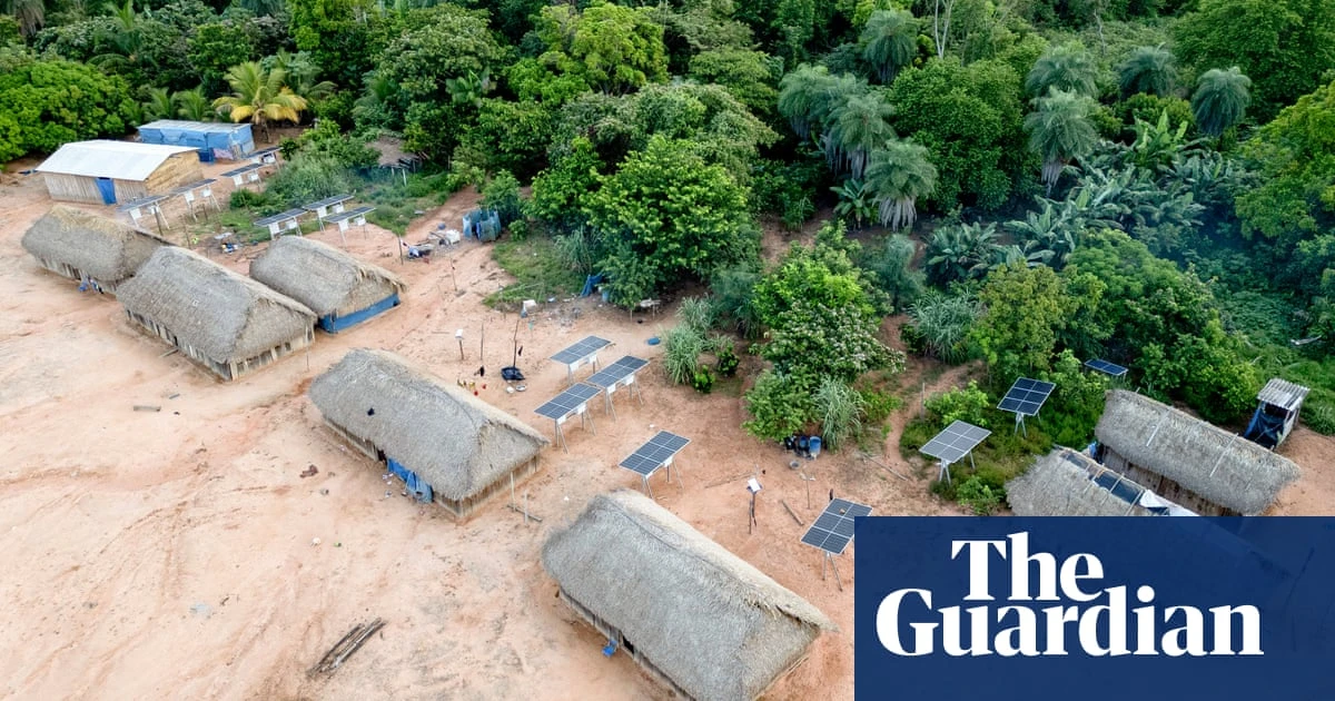 Solar panels and pristine forest: how one Amazon village is adapting to protect itself – in pictures